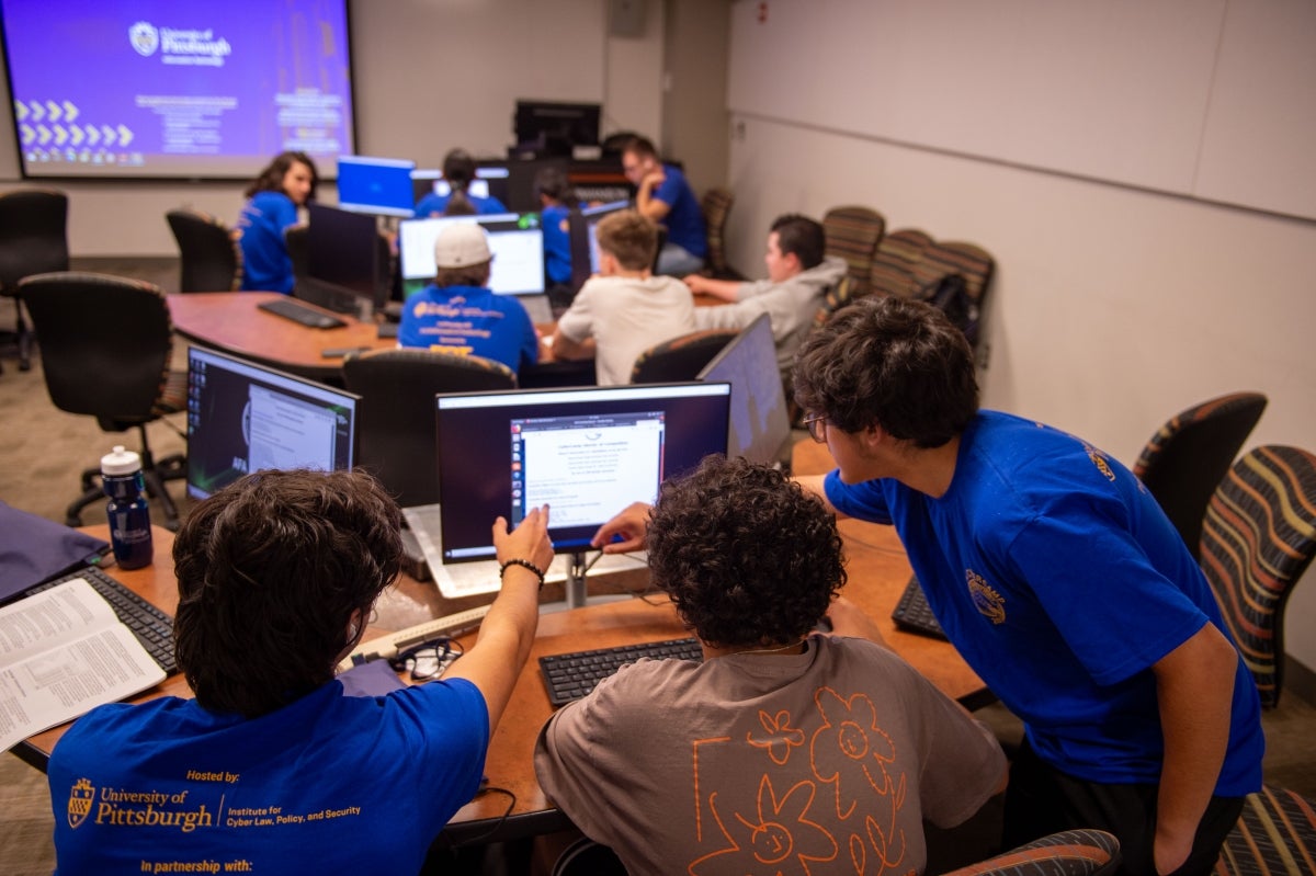 Teams of CyberCamp students working together