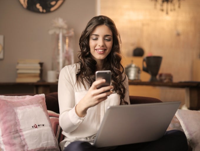 woman checking phone