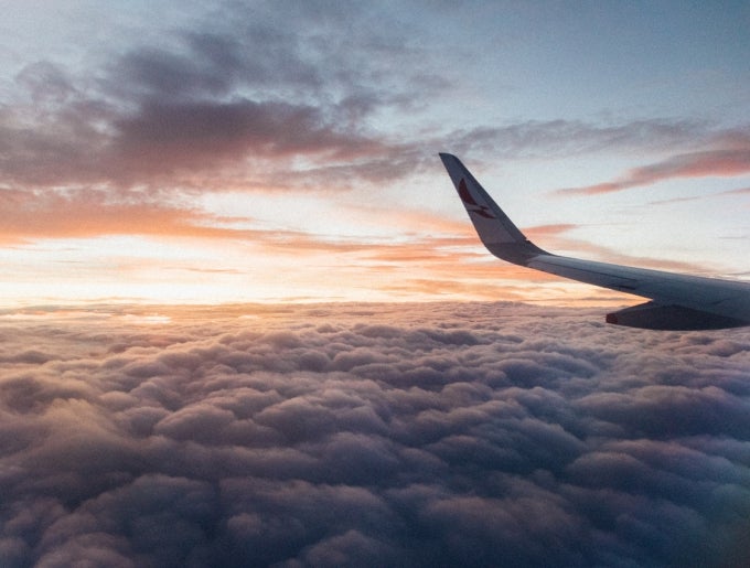 Plane wing in the sky