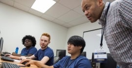 Kevin Fung and other CyberCamp students working with Pitt IT’s Jeff Raymond.